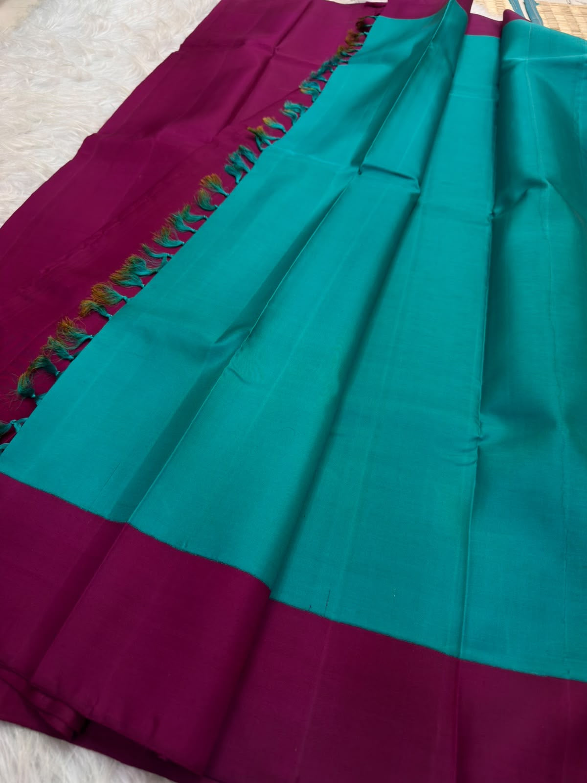 Turquoise blue pallu of Vadamalli pink Kanjivaram silk saree