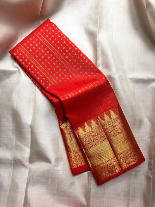 Vermilion Red Handwoven Pure Silk Kancheepuram Saree with Kamalam Diamond Butta and Temple Border
