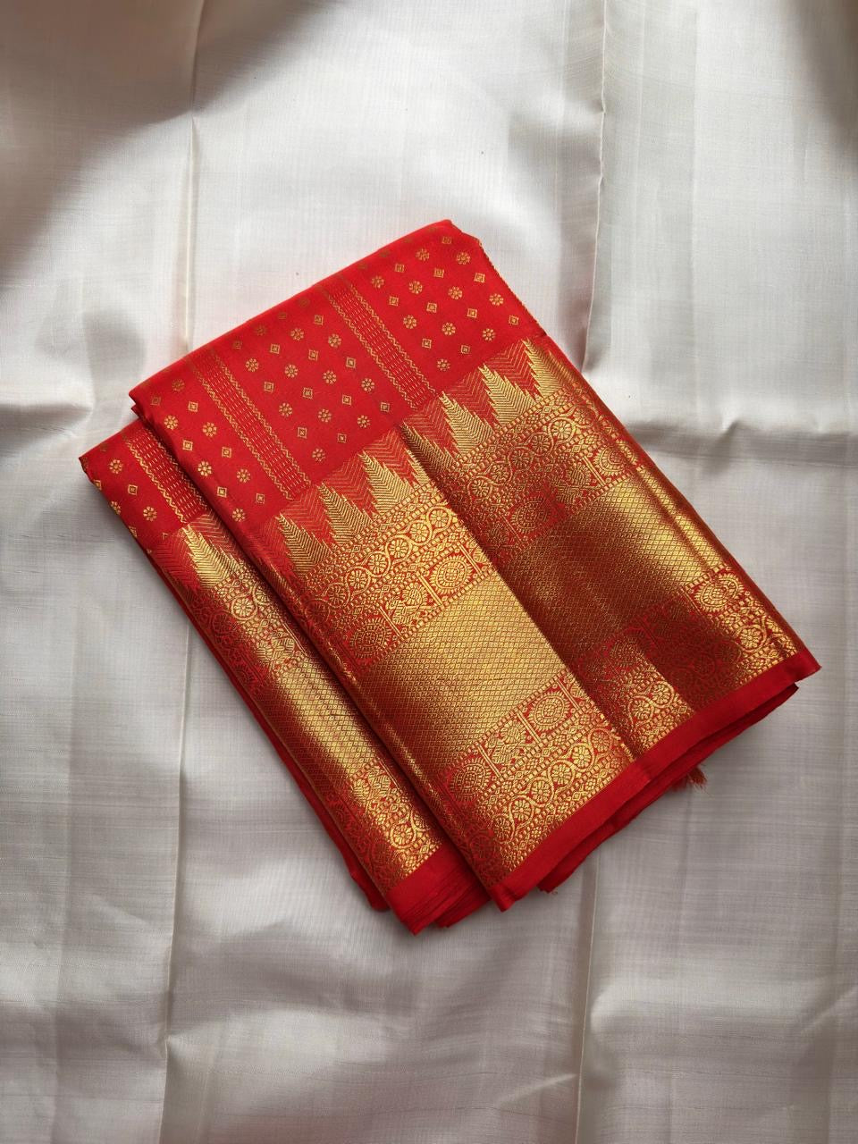 Vermilion Red Handwoven Pure Silk Kancheepuram Saree with Kamalam Diamond Butta and Temple Border