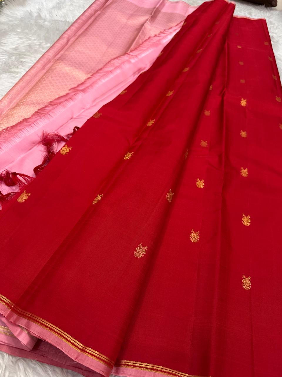 Crimson vermilion Kanjivaram saree with pastel pink border and small Gandaberunda Butta in antique gold zari — Idam Living