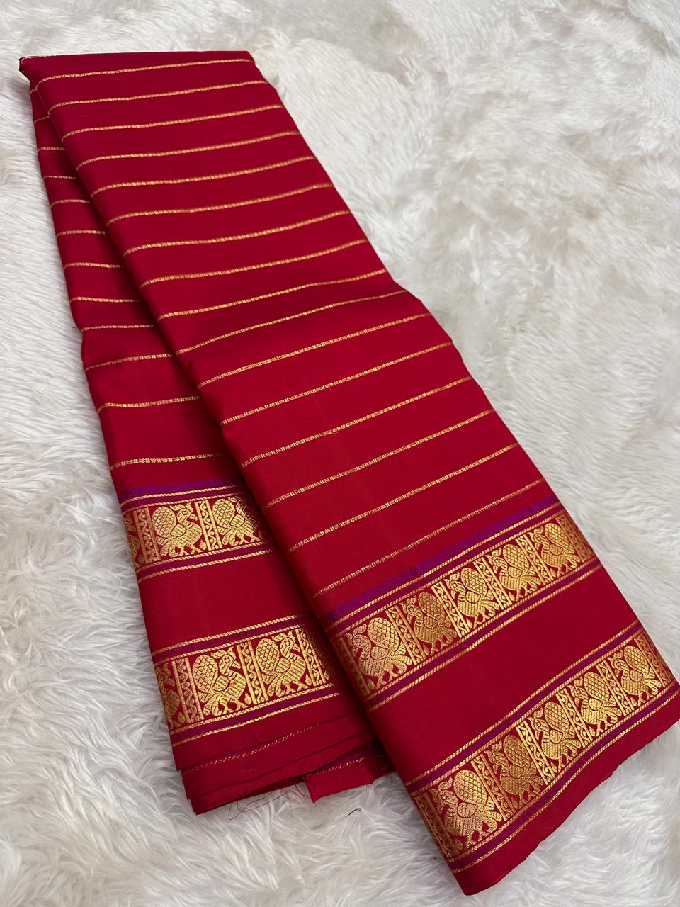 Full view of vibrant red handwoven Kanchipuram pure silk saree with seepu reku body and rettapet border — Idam Living