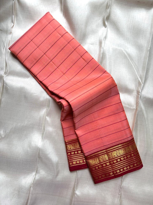 Pure Kanjivaram silk saree in vintage peach with traditional zari border and woven veldhari lines