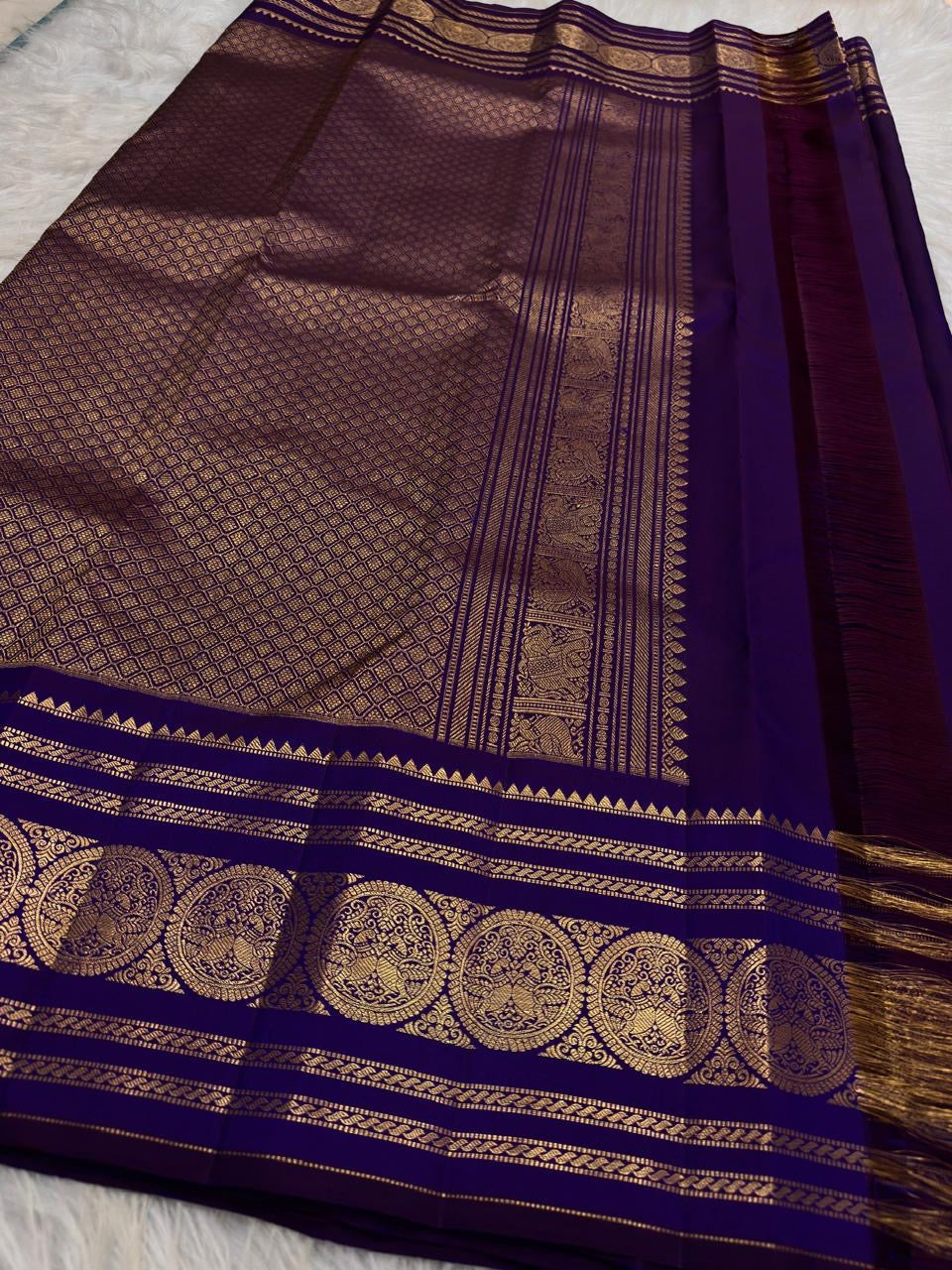 Radiant Neelam Blue pure silk Kanchipuram Varisaipet saree, decorative seer zari weaving.