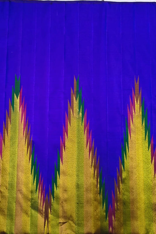 Green pink and gold ettukol border close-up on vivid blue Kanchipuram pure silk saree — Idam Living