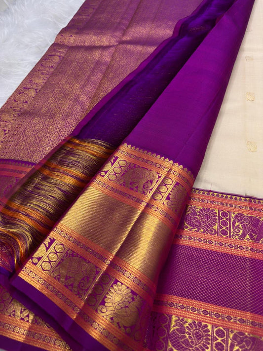 Warm Ivory Korvai saree gold zari butta detail on ivory silk body