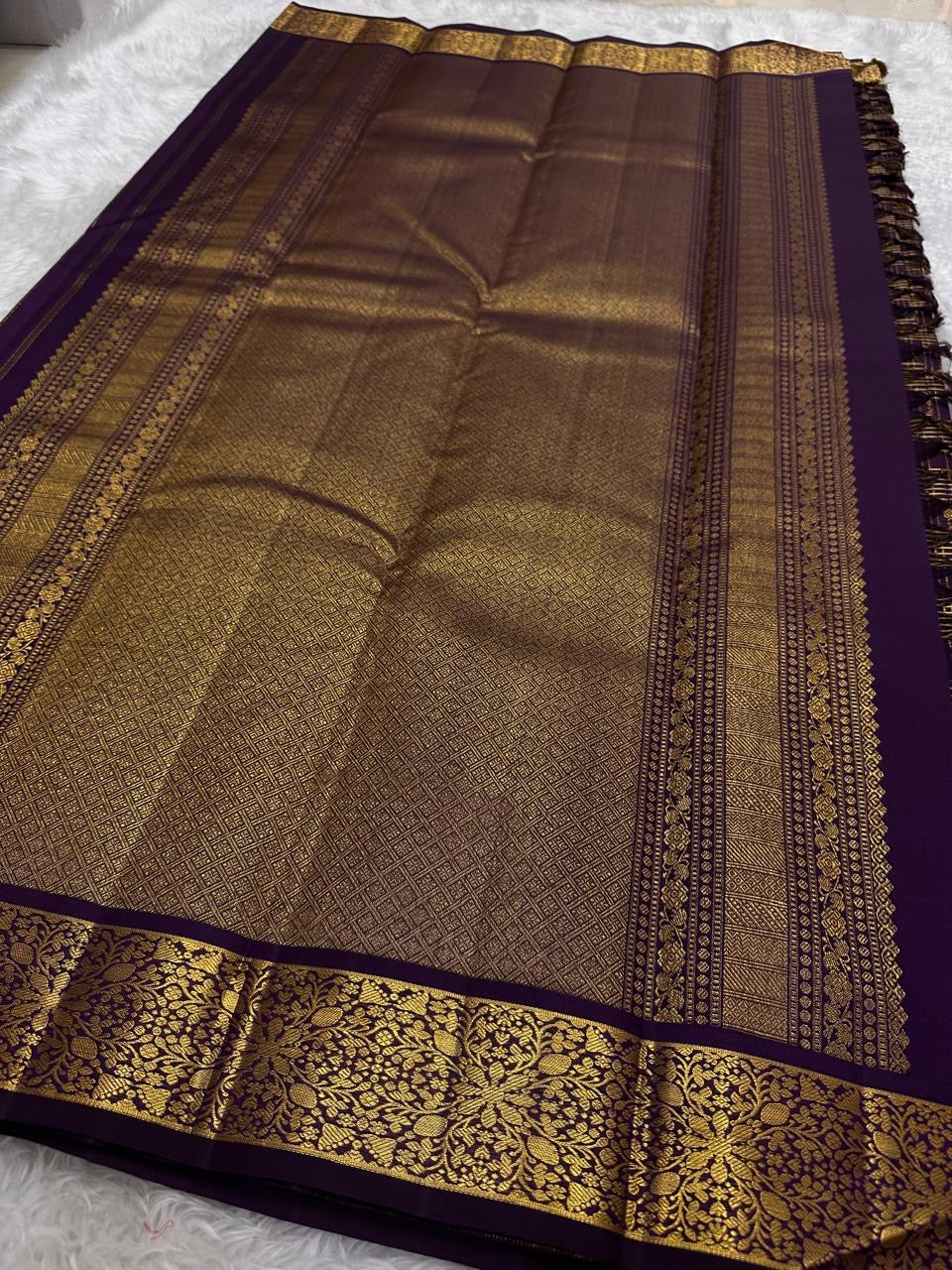 Close-up of wine purple Kanchipuram Zari Kattam silk saree body showing Kili butta within gold check weave — Idam Living