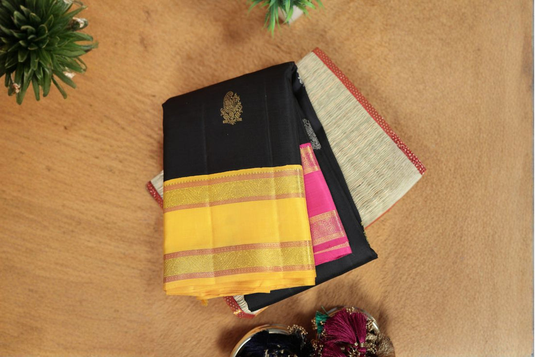 Indian Kanchipuram silk saree for wedding with zari border and traditional design