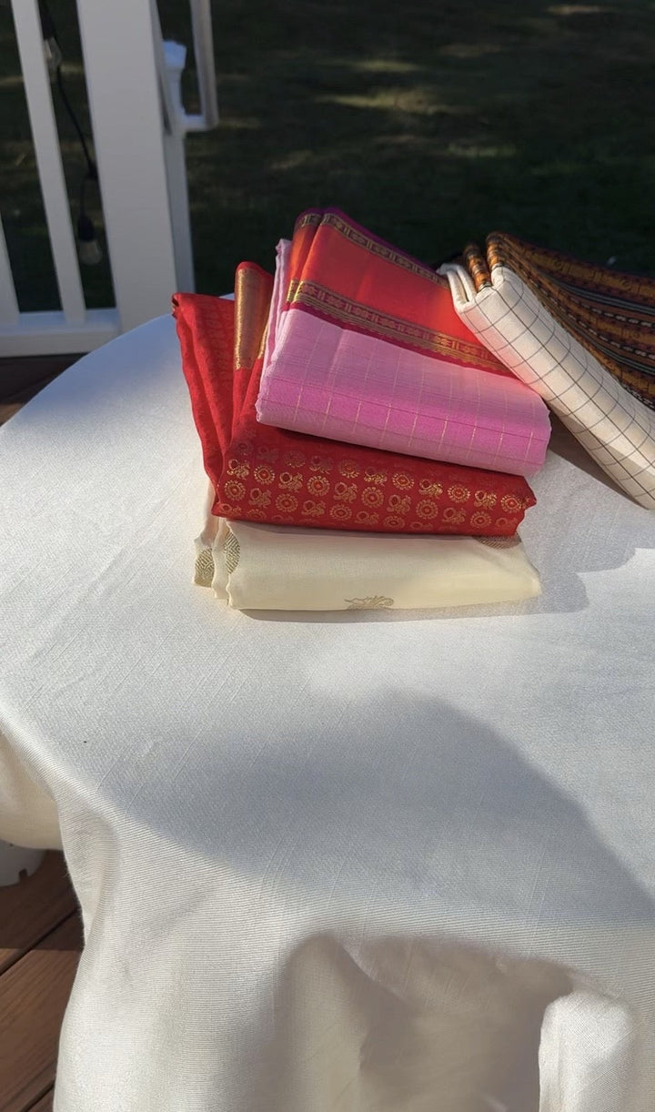 Kanchipuram silk saree folded and stored in a breathable cotton bag — Idam Living