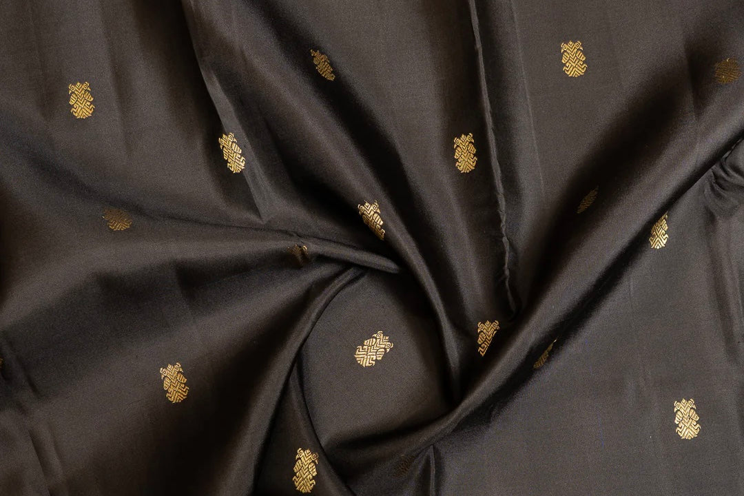 Kanchipuram pure silk sarees with handwoven butta motifs including peacock, lotus and coin butta in gold zari — Idam Living