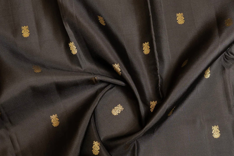 Kanchipuram pure silk sarees with handwoven butta motifs including peacock, lotus and coin butta in gold zari — Idam Living