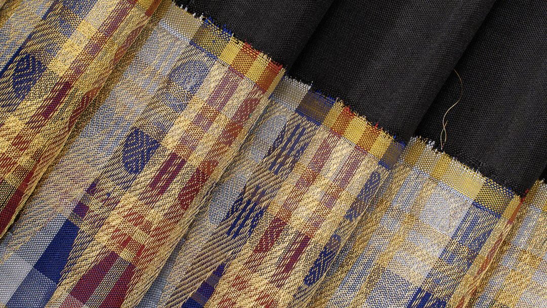     Handwoven pure silk Kanchipuram saree featuring traditional Korvai contrast border and richly woven pallu