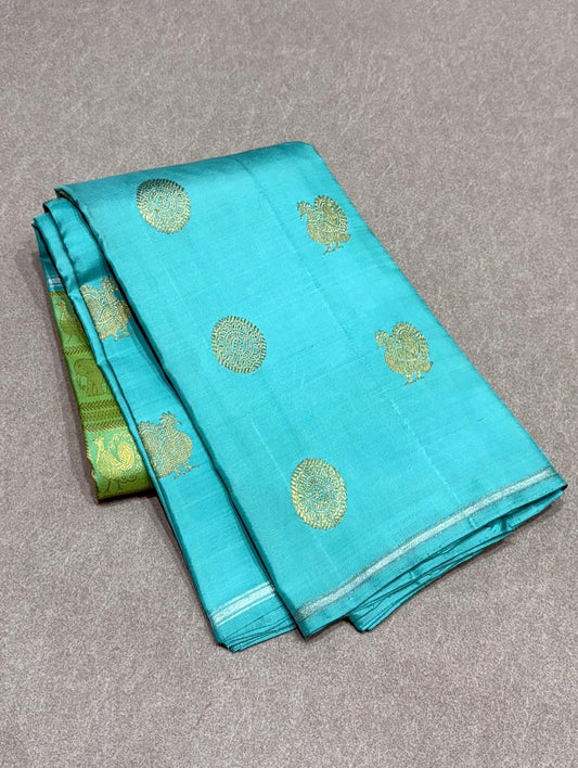 Aaral – Ice Blue & Spring Green Mubbagam Kanchipuram Pure Silk Saree with Mayil Chakram Buttas & Vanasringaram Grid Pallu