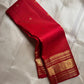 Vermilion Podi Kattam 🌺 Pure Silk Kanchipuram Saree

All-over zari pinstripes & mini podi kattam checks ✨

Broad antique-gold borders with chakram medallions 🪙

Silk Mark Certified ✅ | F