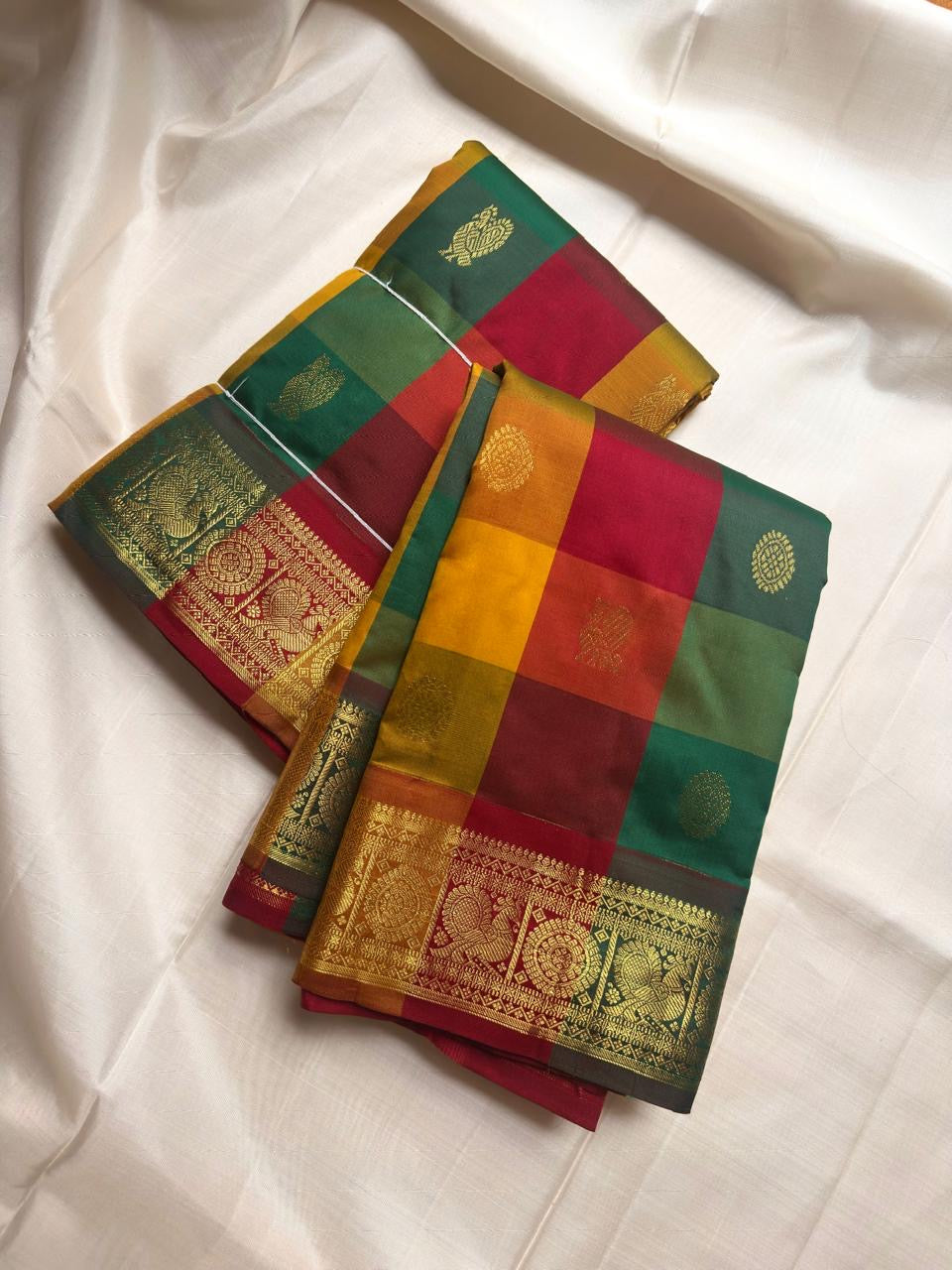 Multicolour handwoven pure silk Kancheepuram Paalum Pazhamum saree with zari border, front drape