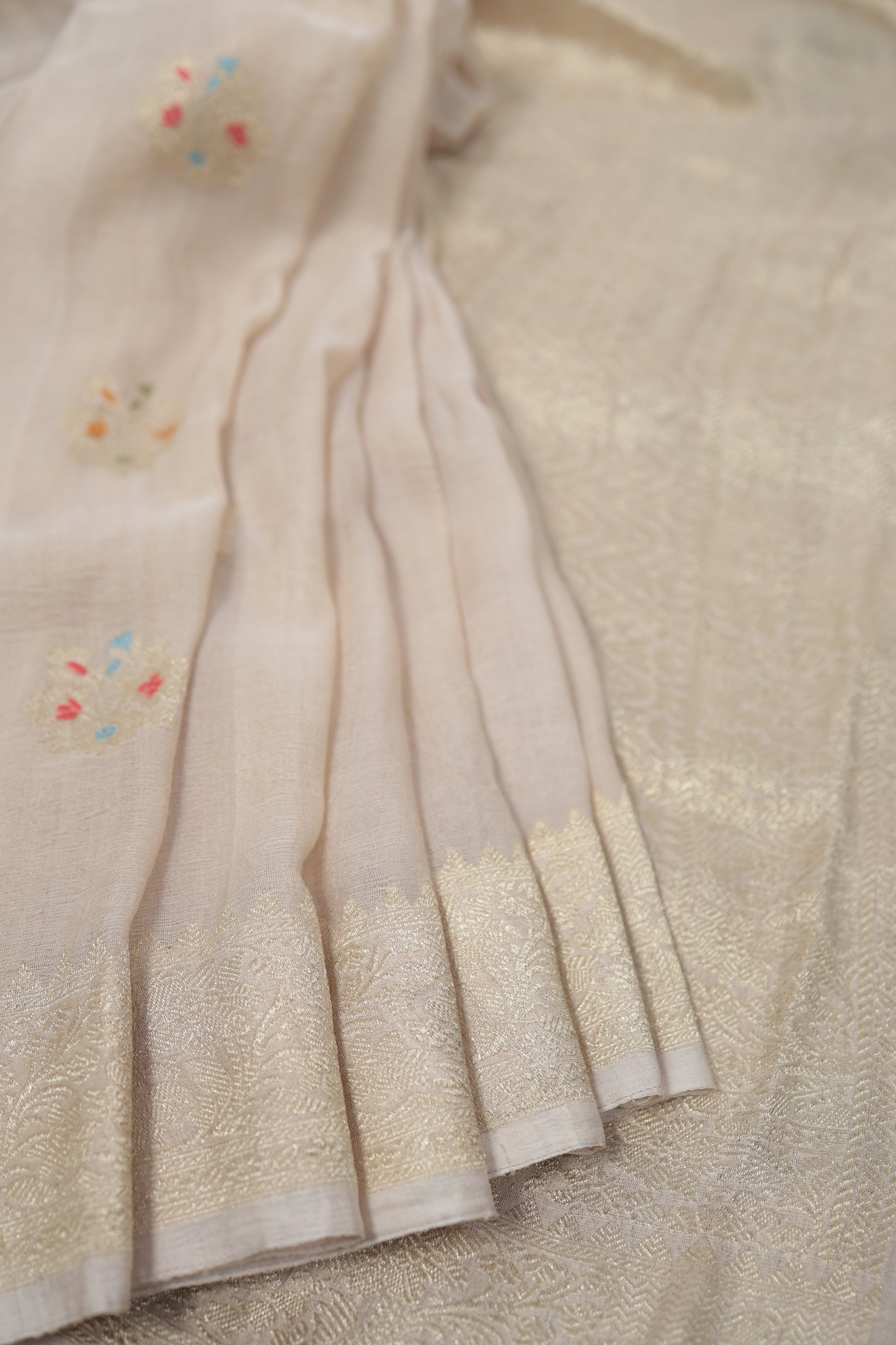 Pure tussar georgette Banarasi silk saree in golden beige with tailored embroidered velvet blouse