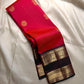 Vivid red  shot deep pink with coffee brown Mayil Kamalam rettapettu border and butta paisley Zari woven butta on body pure silk Kanchipuram saree