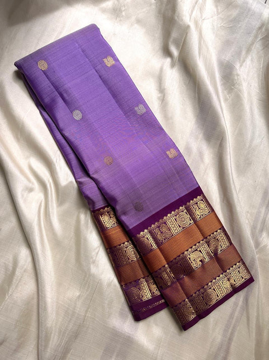 Lilac and deep purple with magenta varisaipet border in rust and vanasringaram pure silk Kanchipuram saree