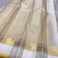 Kiran ivory whiteb oosi kattam  ✨ – ivory and gold  Kanchipuram Pure Silk Saree
Korvai Gold Zari Border with Elephant & Floral Motifs
Body Woven in Zari Kattam Checks with Scattered Gold Buttas
Grand Zari Brocade Pallu | Silk Mark Certified |