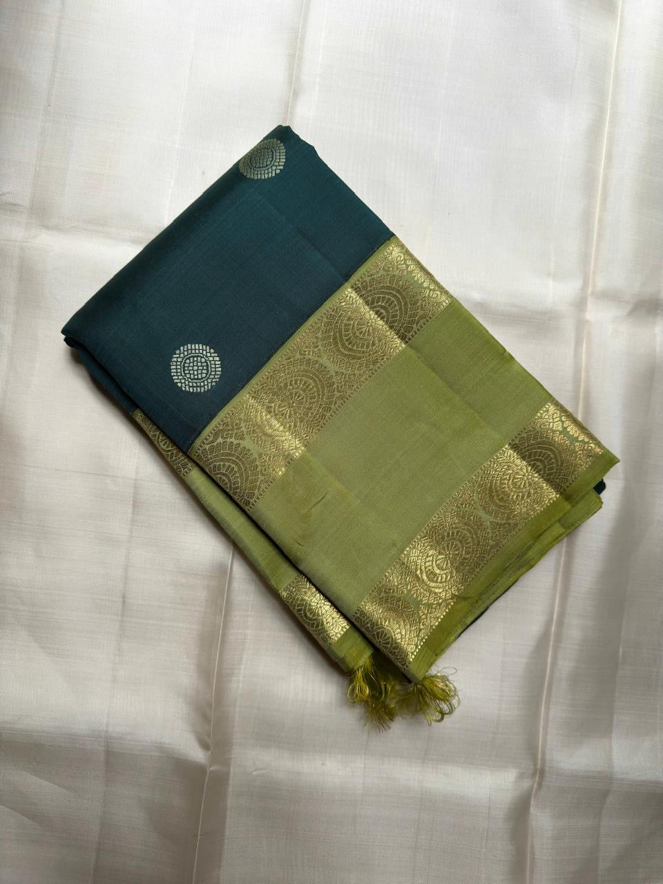 Peacock teal pure silk saree body close up view