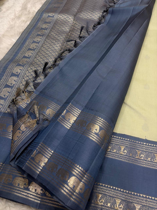 Sage green pure silk saree body close up view