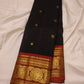 Full view of black pure silk Kanchipuram saree with red contrast border