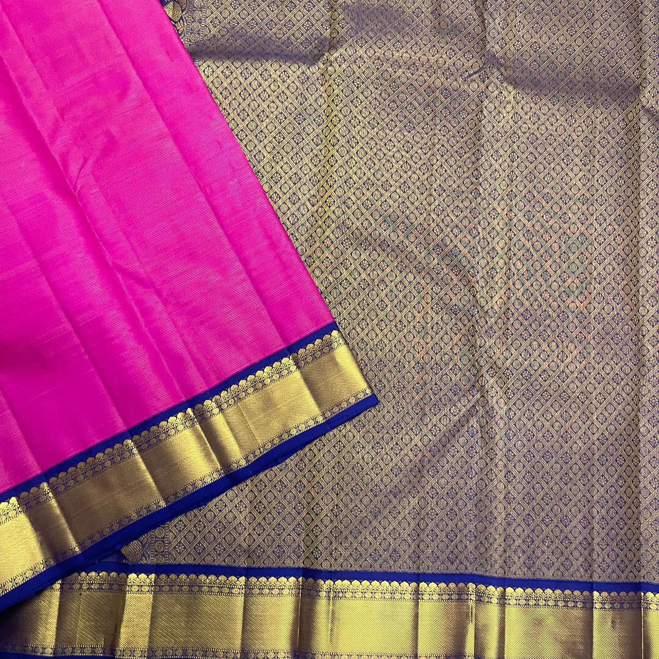 Royal blue border with traditional gold zari on pink Kanchipuram silk saree