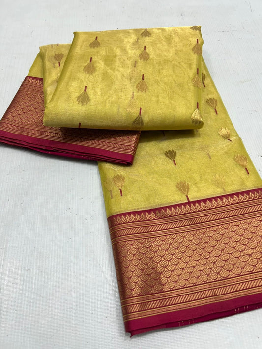 Close-up of antique gold zari buttas on yellow Chanderi silk by katan tissue saree
