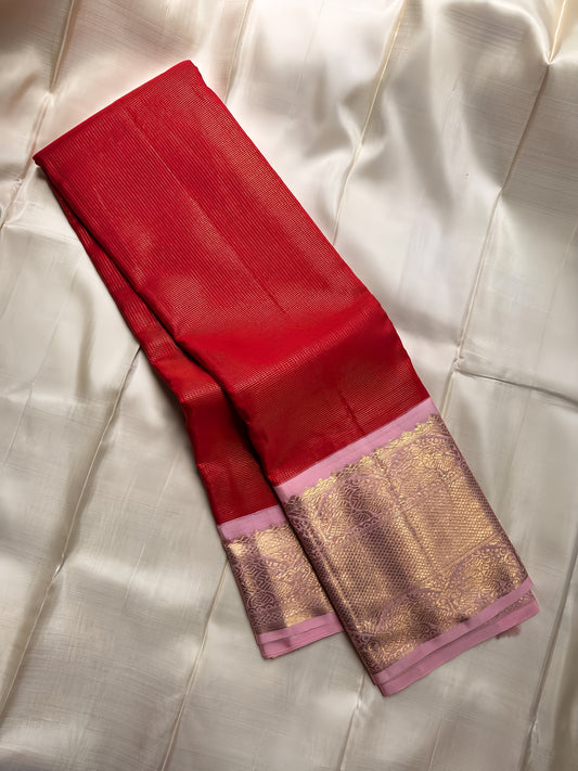 Pure silk vibrant chilli red body with   Zari kattam , pastel pink border with dual Peacocks on stambham Motifs - pure 3g zari ( certificate provided)