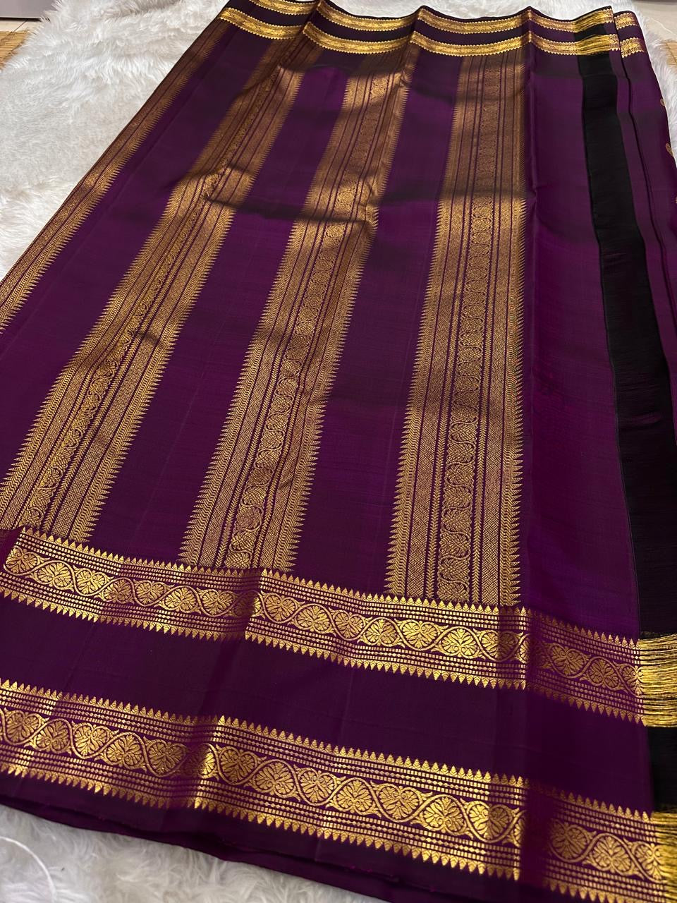 Nalini 💜✨
Deep Purple shot with magenta Pure Silk Kanchipuram Saree
Sonarupa Silver Butta & Rettapet Border
Thangam Velli Pallu with Timeless Elegance
Silk Mark Certified | Blouse fabric Attached | Free USA Shipping
