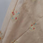 Festive golden beige Banarasi saree paired with embroidered velvet blouse