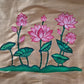 Artisan hand painting lotus motif on pure silk blouse fabric