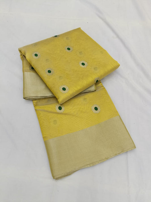 Golden yellow pure silk Chanderi saree with rich green border