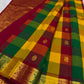 Close-up of Paalum Pazhamum jewel-tone checks on Kancheepuram silk saree body