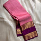 Blush Lattice – Pure Kanchipuram Silk Saree
Pleasant Pink Body with Zari Kattam Checks
Petite Kamalam Buttas Scattered Across the Body
Contrast Purple Rettapet Border with Ornate Motifs
Grand Purple Pallu. Silk Mark Certified, delivery in 2 weeks