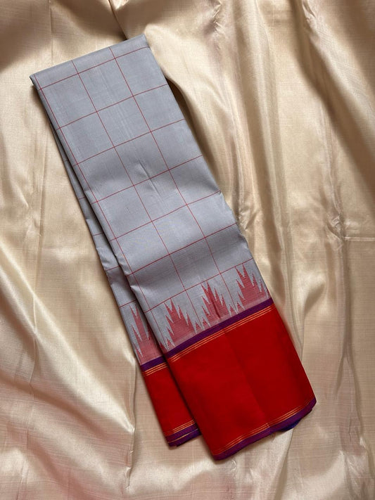Tazhampoo 🌸 – Blue Kanchipuram Pure Silk Saree
Thazampoo Reku in Bright Orange-Red Border
Purple Selvedge for Vibrant Contrast
Handwoven in Our Family Village, Kanchipuram
Silk Mark Certified | Blouse fabric Included |stitching Available
