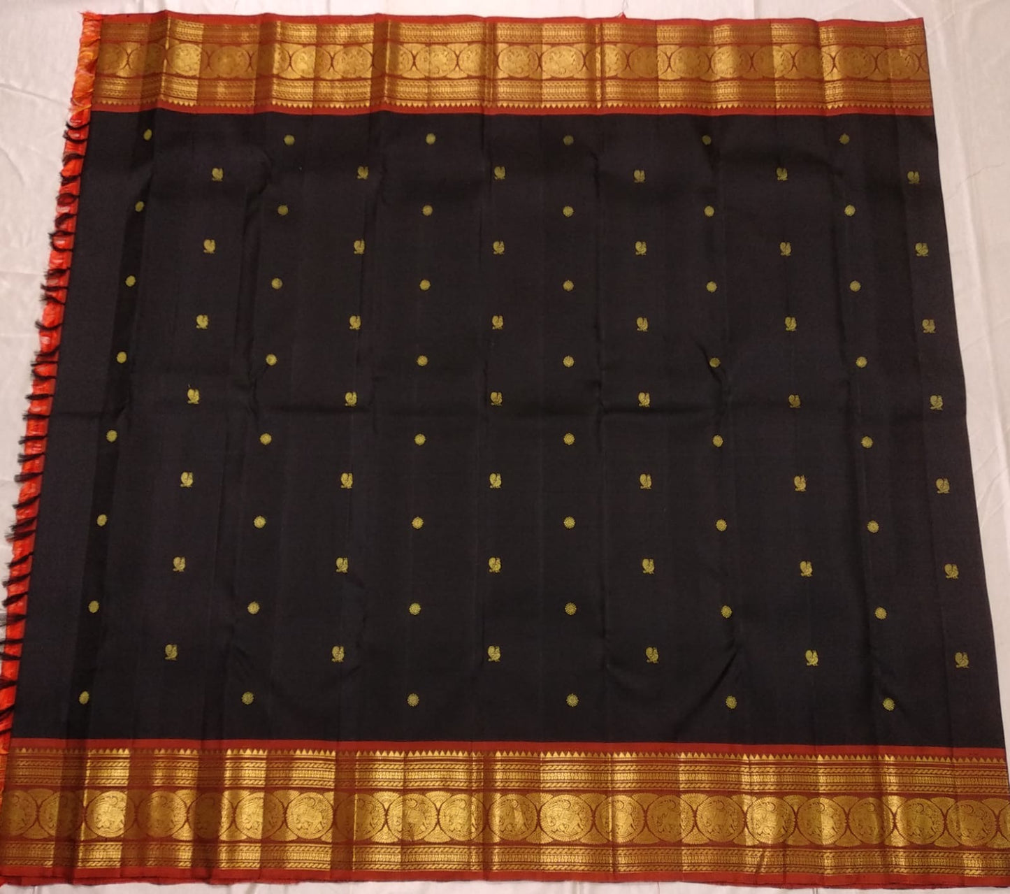 Traditional gold zari temple border on black pure silk saree