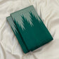 Emerald green and misty sage Kancheepuram pure silk saree with pointed Thazampoo Reku Korvai forms.