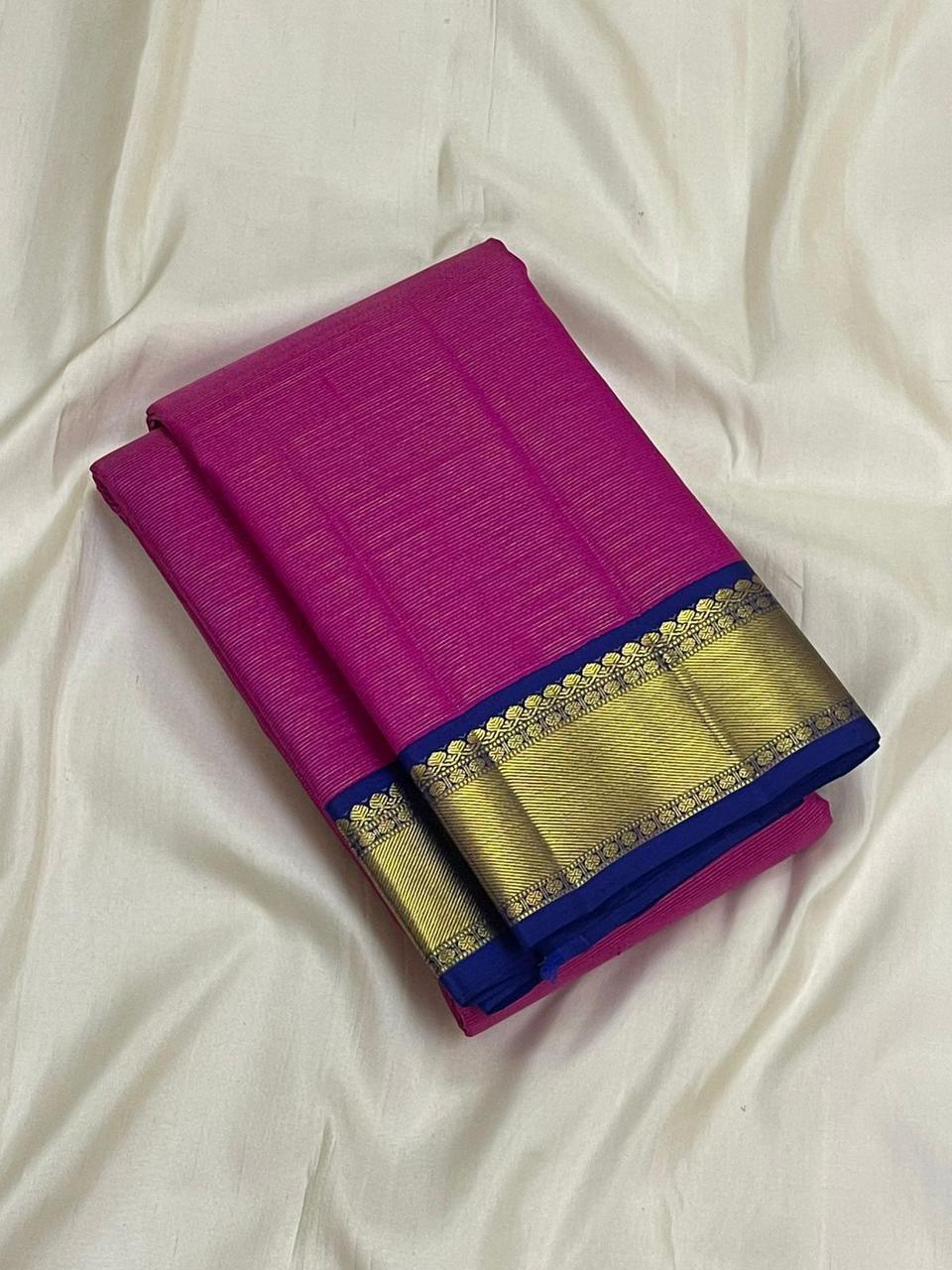 Close up of pink Kanchipuram silk saree showing Vairaoosi weave texture