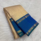 Close view of the peacock blue-green shot silk Kai Korvai border with alternating Kamalam and Kolam Suzhi gold zari bands.
