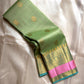 Rose pistachio meadow  – Pure Silk Kanchipuram Saree
Pista Green Body with Coin Paving Mayil Zari Buttas 🦚
Borders in Aqua & Rose with Pillayar Moggu Motifs ✨
Grand Aqua Pallu in All-Over Zari Brocade Weave
Silk Mark Certified | ships in 2 weeks
