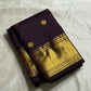 Nagavalli – A Midnight Jamun Dream in Kanchipuram Silk, Woven with Gold Coin Buttas, Temple-Inspired Arai Maadam Border, and Rudhraksham Seer in Lustrous Zari