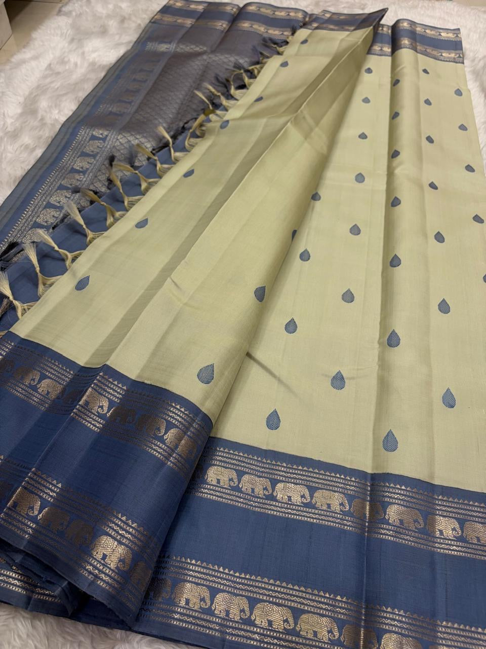 Pallu detail of sage green Kancheepuram silk saree