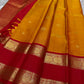 Traditional gold zari paisley detailing on red border of Kanchipuram rettapet saree