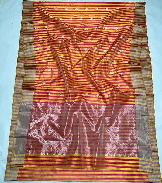 Close-up of Ek Naal Butti woven on pink yellow striped Chanderi silk