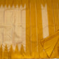 Traditional Thazampoo Reku Kanchi pattu saree in golden mustard and sandalwood ivory handwoven silk.