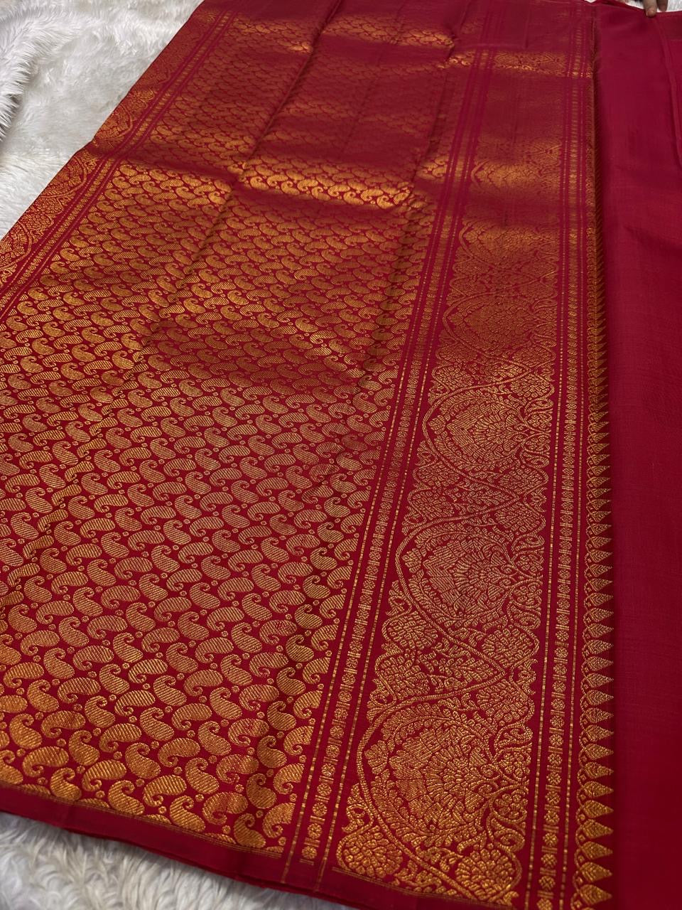 Svaroopam Red
Kumkum-Red Kanchipuram Silk Saree
Zari-Woven Peacock Procession Heirloom
