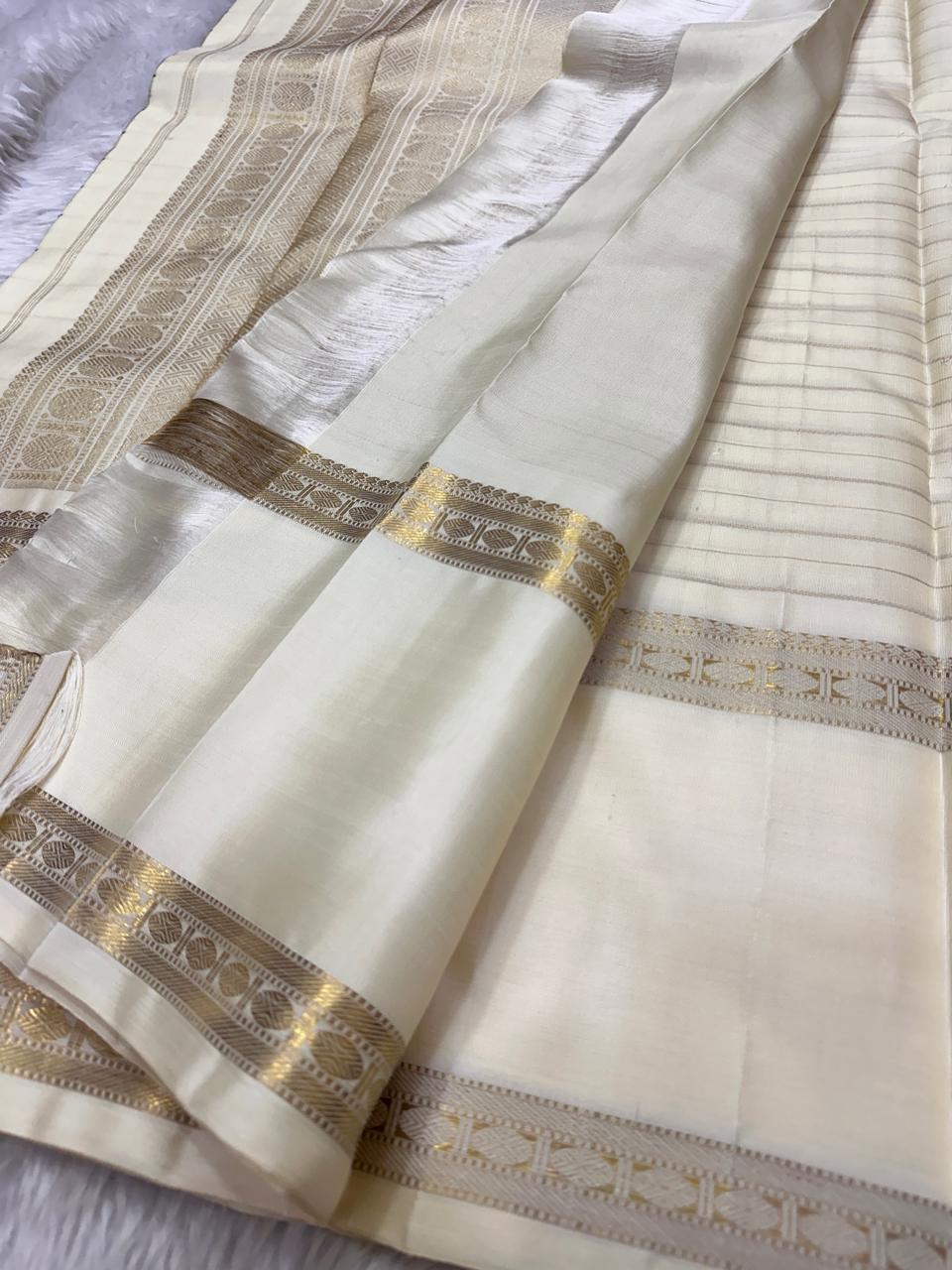 Swarna Kattam — Pure Silk Kanchipuram Saree
Ivory–gold body with zari kattam checks & rich pallu ✨
Silk Mark Certified • Ships in Two Weeks • Free Shipping within USA