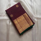 Madhuvanam — Pure Silk Kanchipuram Saree
Brownish-plum body with gold buttas & kattam checks ✨
Antique-gold korvai borders & grand magenta zari pallu 🌸
Silk Mark Certified • Ships in Two Weeks • Free Shipping within USA