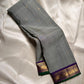 Dove Gray Mayuri — Pure Kanchipuram Silk Saree ✨
Soft dove-gray body with gold coin buttas, violet borders & emerald selvedge 💜
Silk Mark Certified ✅ | ships in two weeks