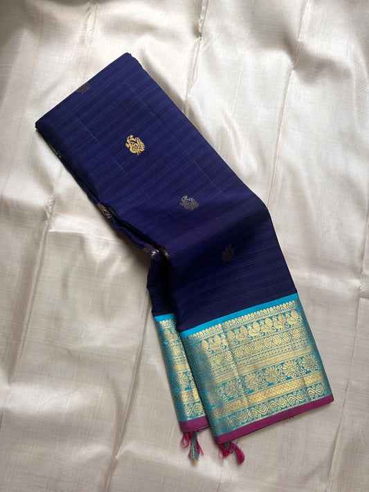 Ramya – Royal Blue Kanchipuram Pure Silk Saree with Zari Peacock Buttas, Sky Blue Varisaipet Border & Pastel Blue Pallu”